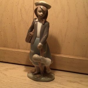 Lladro school girl with doll
